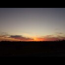 Noch ein paar Kilometer vor uns, nahmen wir uns nicht viel Zeit für den Sonnenuntergang